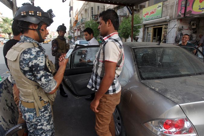 Mosul thất thủ, nửa triệu người Iraq sơ tán ảnh 1
